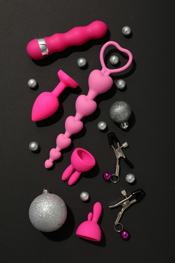 Sex,Toys,With,Christmas,Decorations,On,A,Dark,Background.